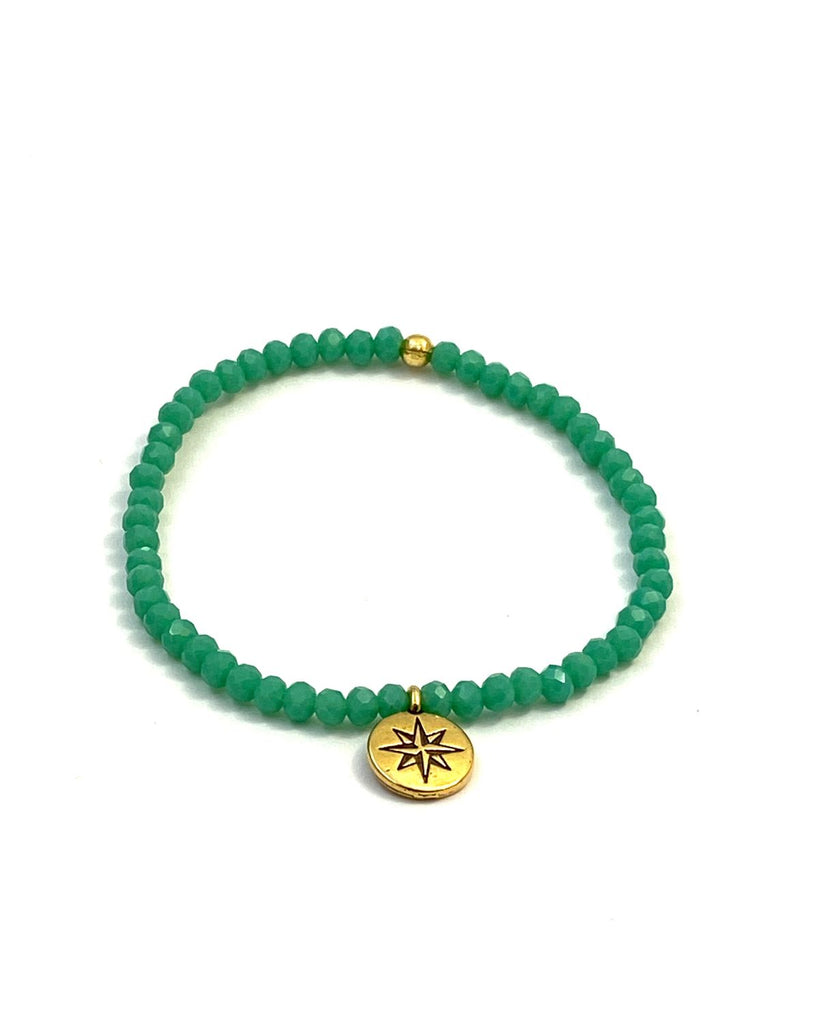 jade green small beaded bracelet on stretch cord with gold compass disc charm