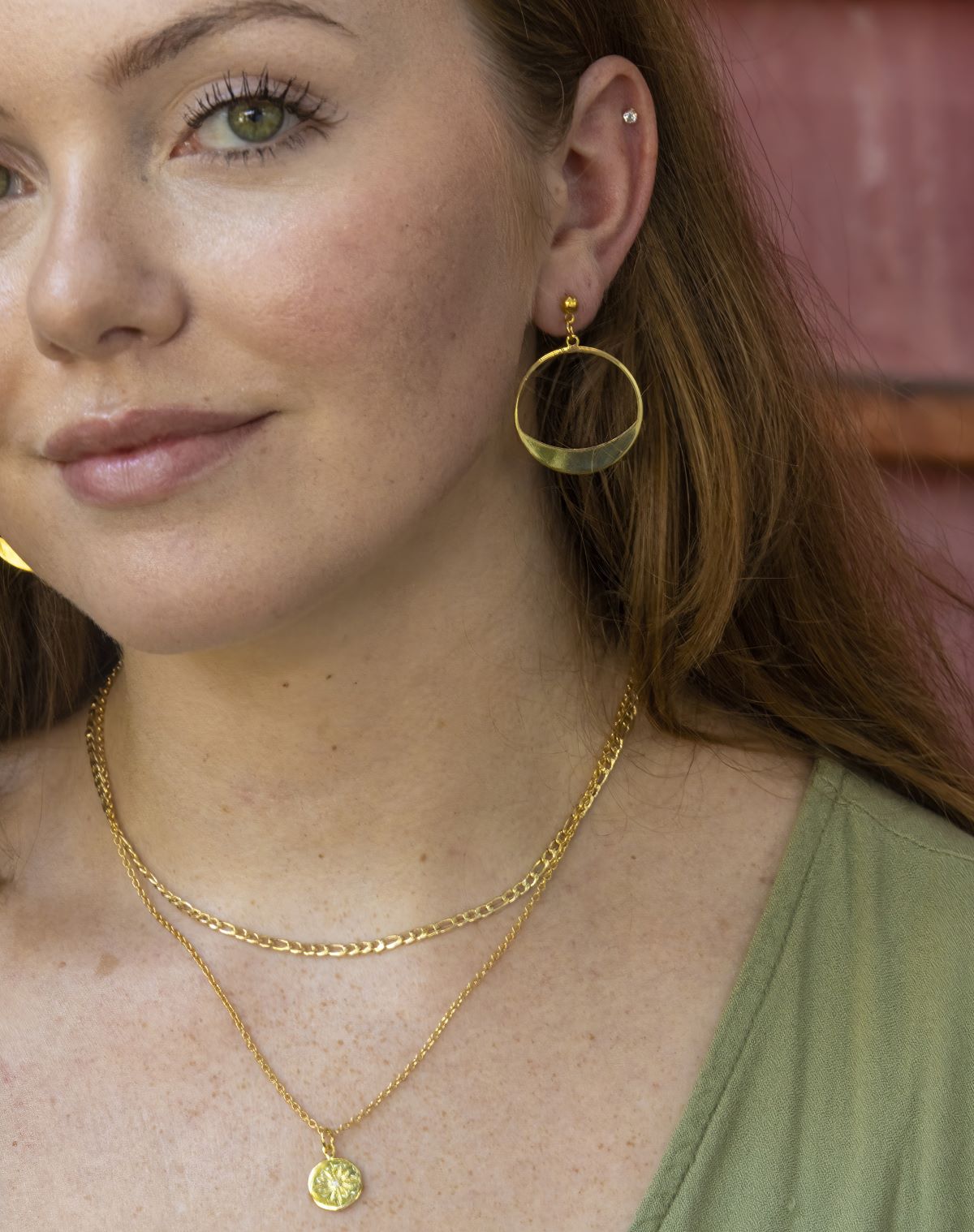 gold hoop earrings on stud
