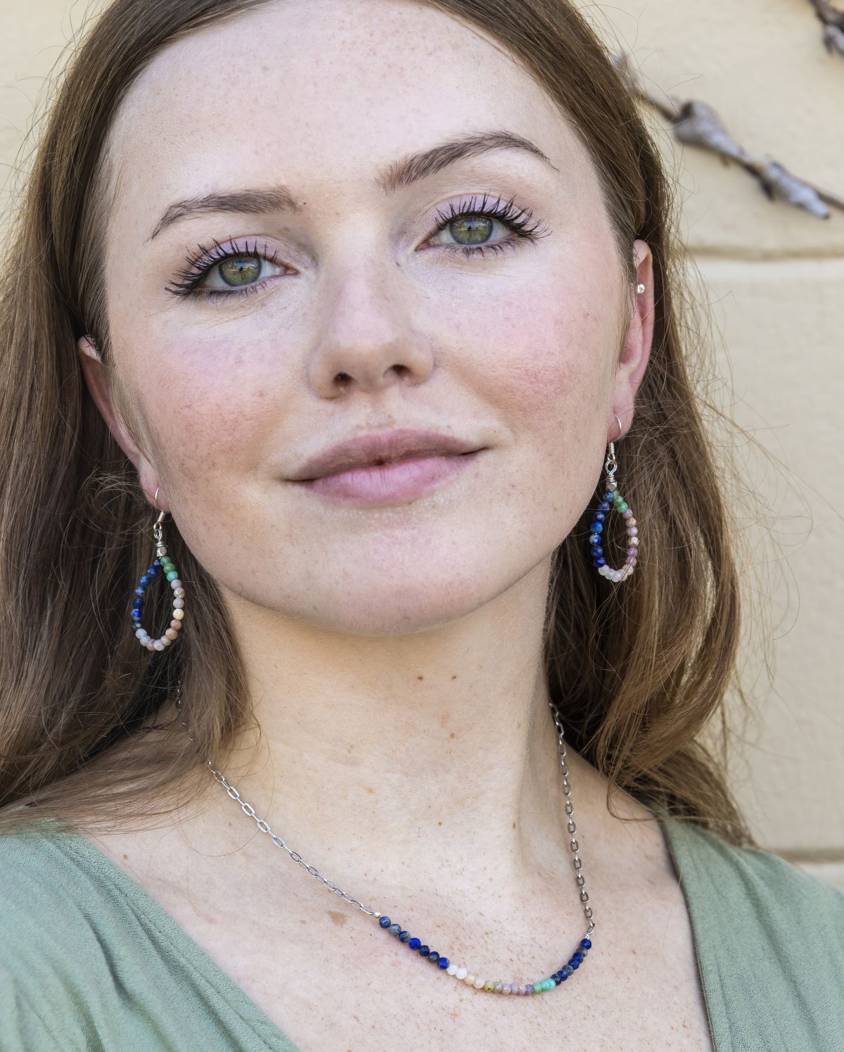 multicolor gemstone earrings on silver ear wire
