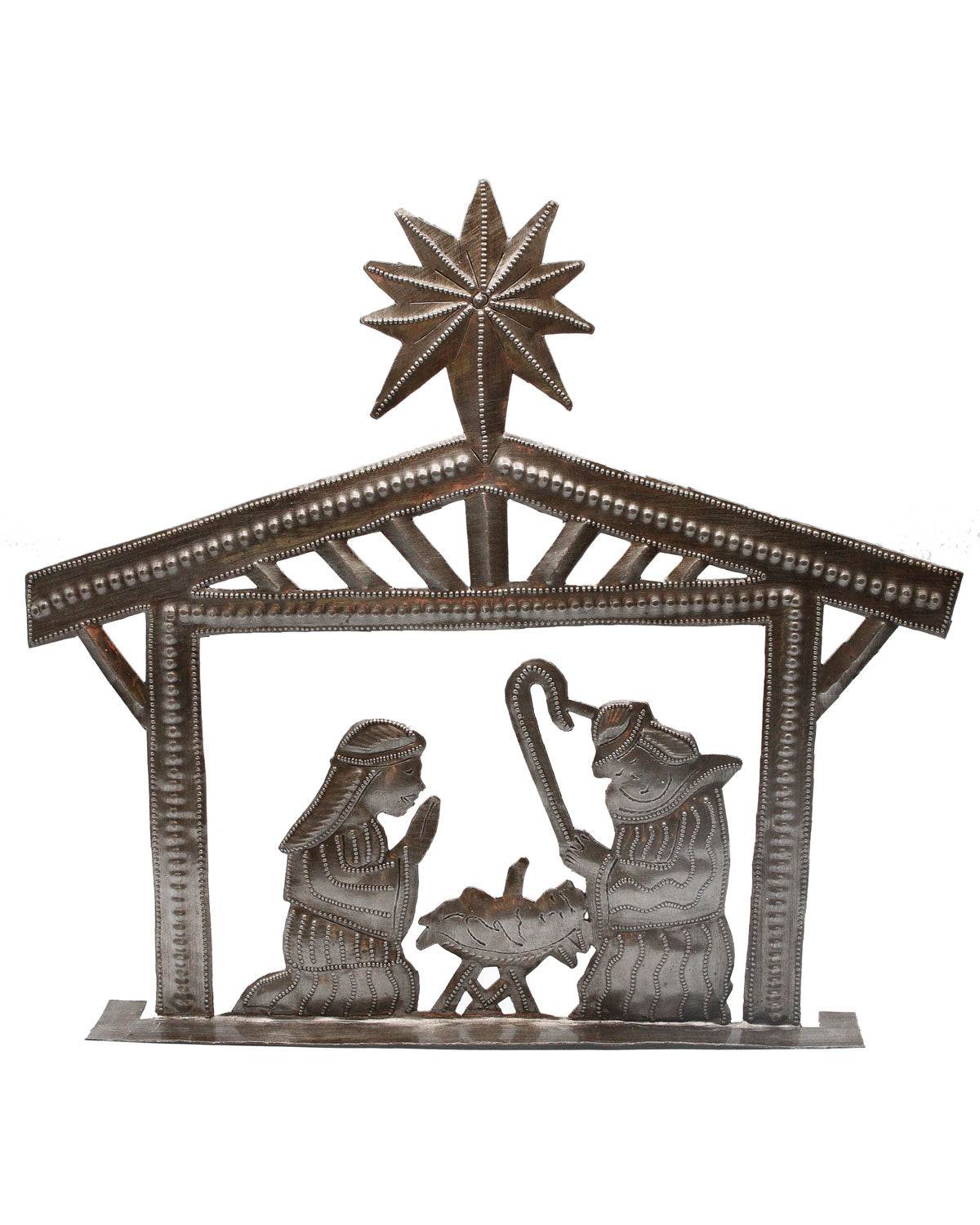 A metal nativity art piece with a star-shaped top, depicting the stable scene with the baby Jesus and the shepherds.