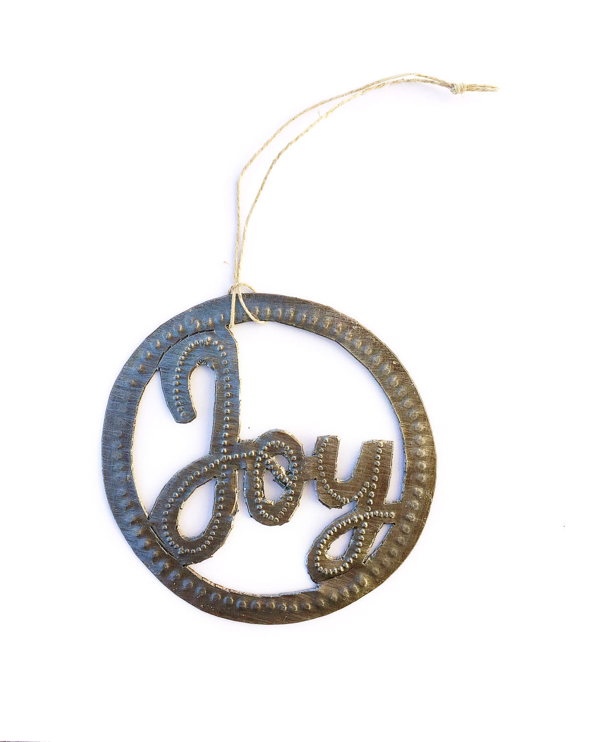 A metal art ornament with the word 'joy' inscribed on it, created from recycled metal.