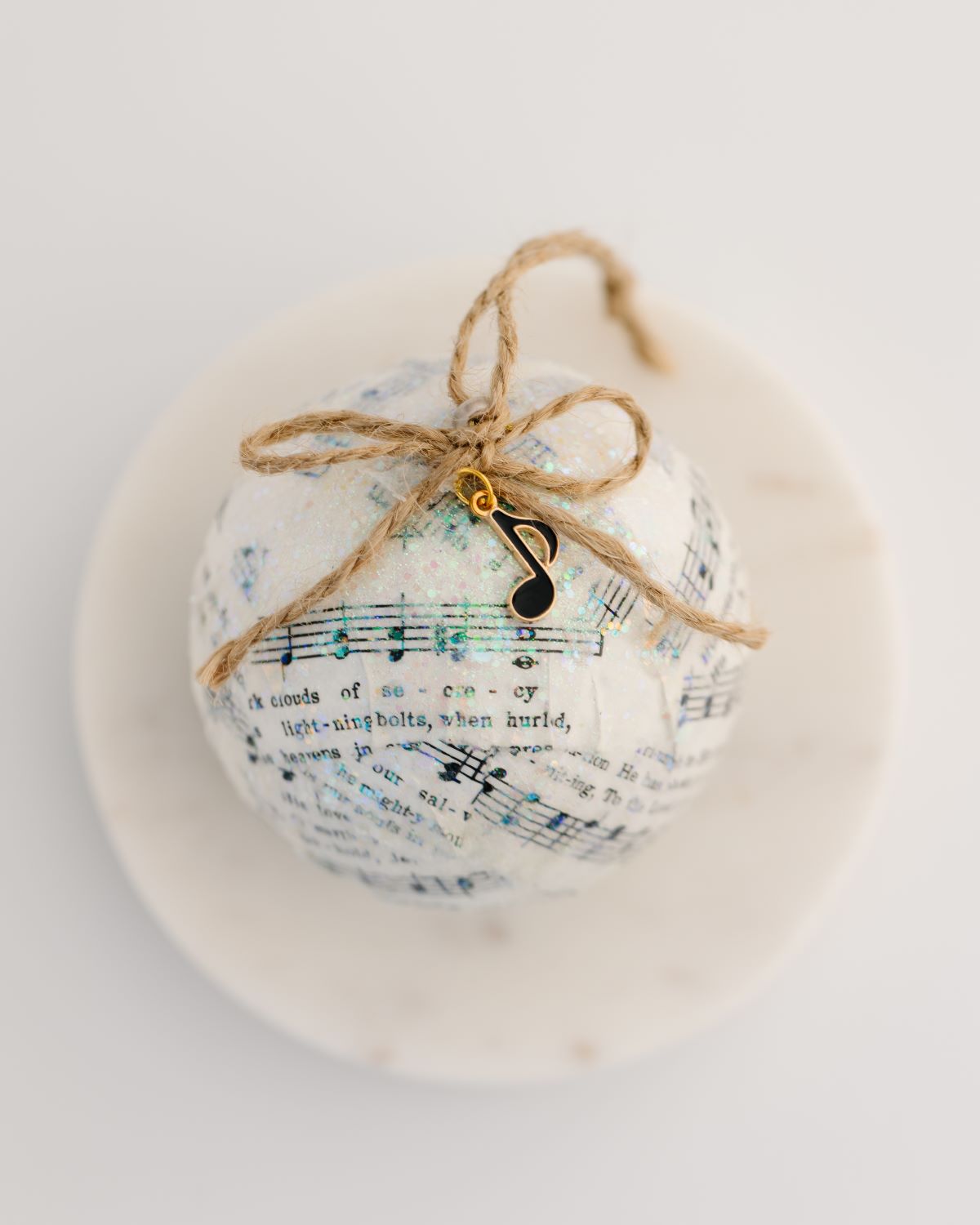 ball ornament made with recycled hymnal paper