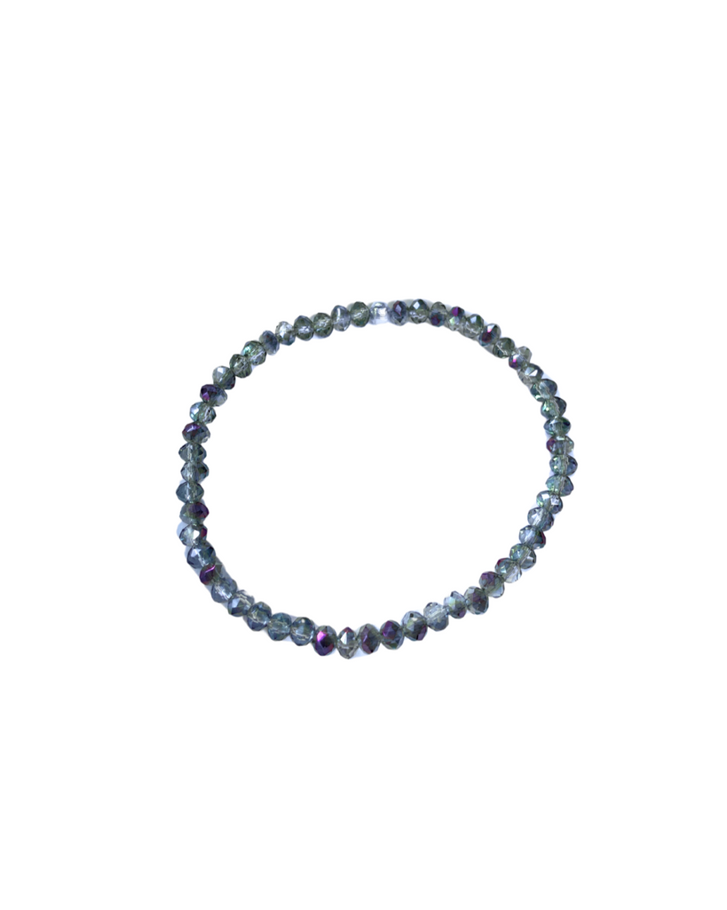 Iridescent silver glass beads strung into a stretch bracelet.