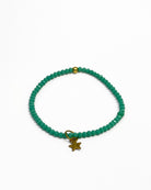 Teal beaded stretchy bracelet with gold star charm