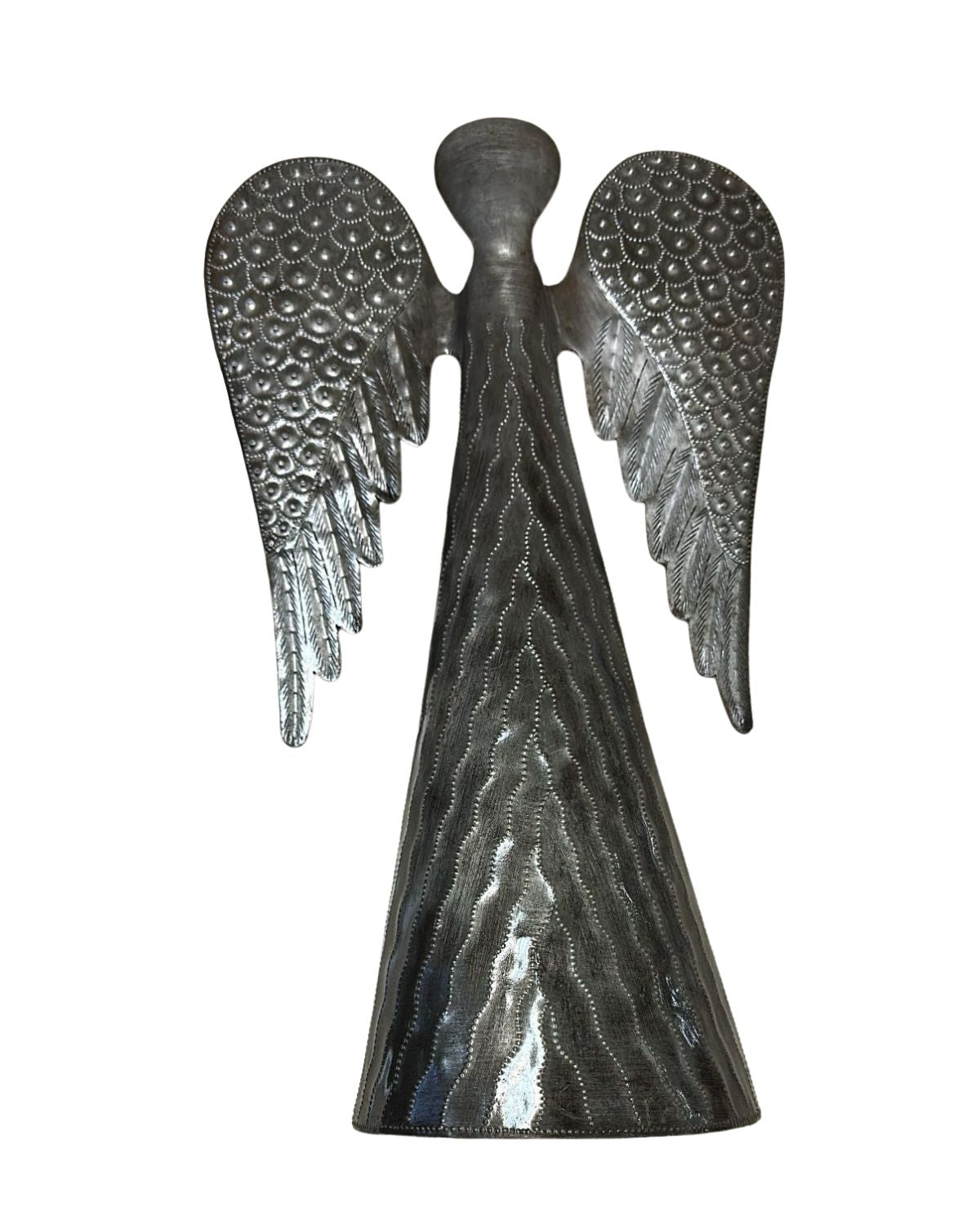 Decorative angel sculpture with textured wings on a white background