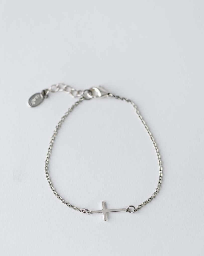 silver cross connector on silver chain bracelet