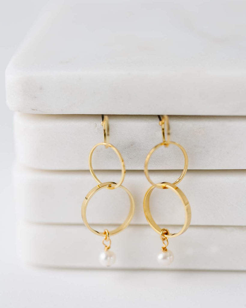 2" long gold triple hoop earring on post with pearl drop