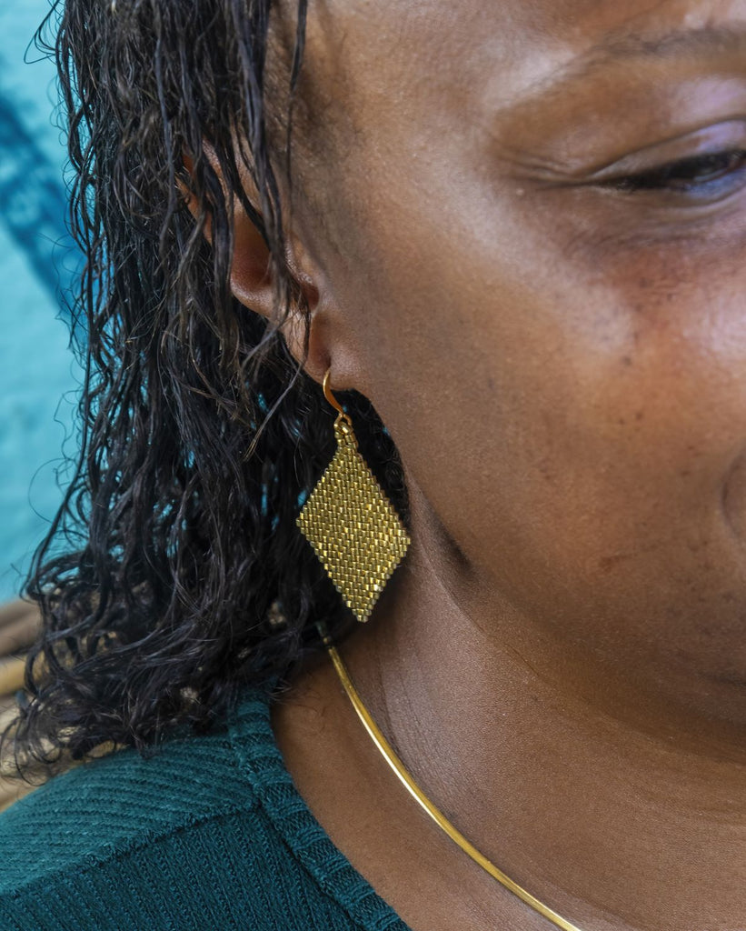 gold diamond-shape beaded earrings on ear wire