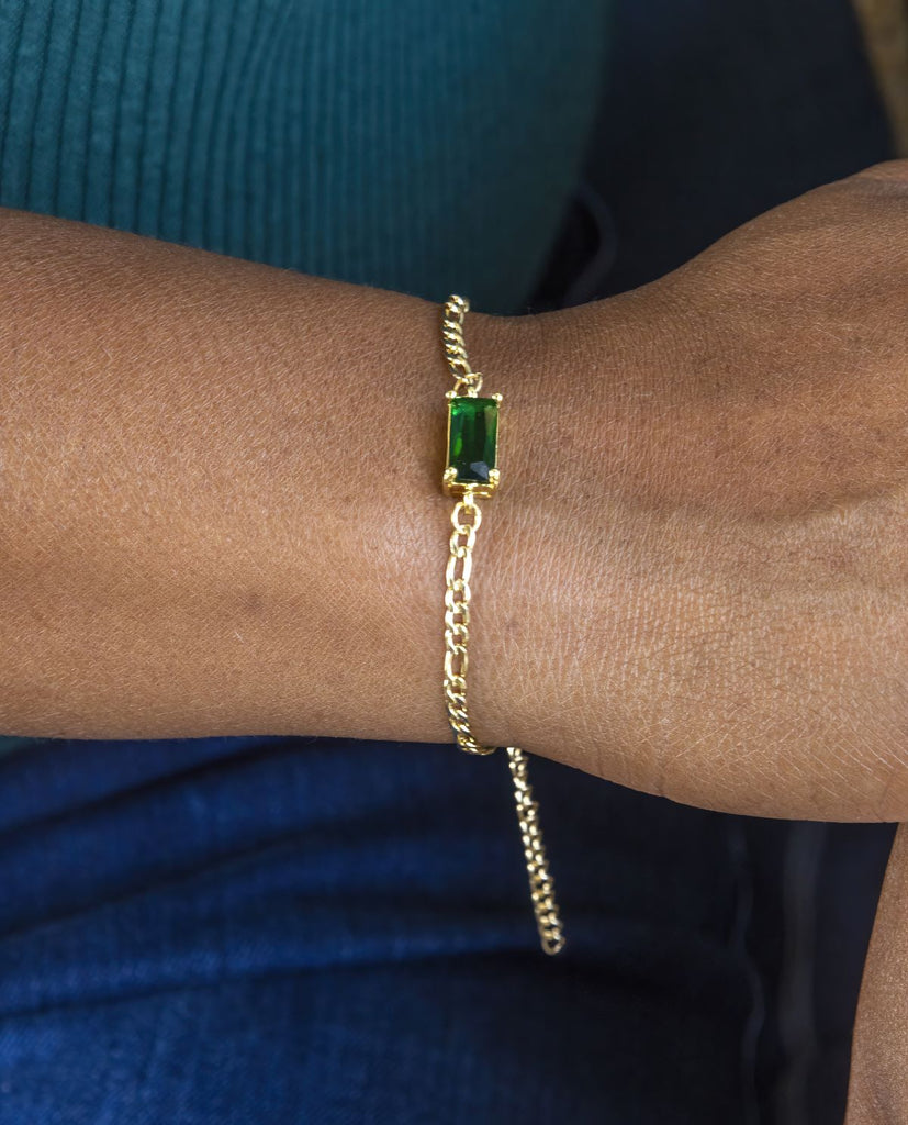 gold figaro chain bracelet with .5" emerald green CZ rectangle connector charm
