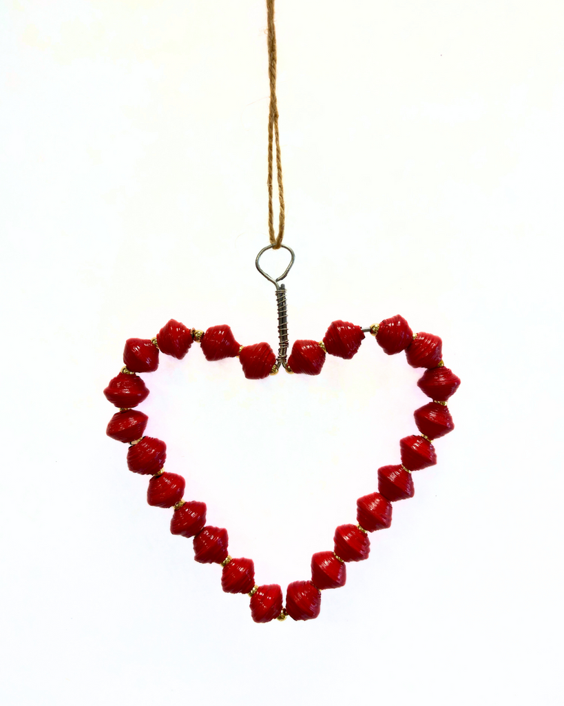 Red paper beads on a wire ornament in the shape of a heart