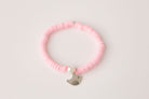 pink clay bead youth bracelet with silver baby bird charm