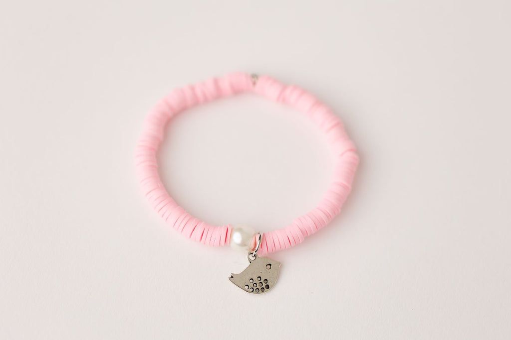 pink clay bead youth bracelet with silver baby bird charm