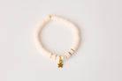 blush clay bead youth bracelet with pearl accent and gold spacers and star charm